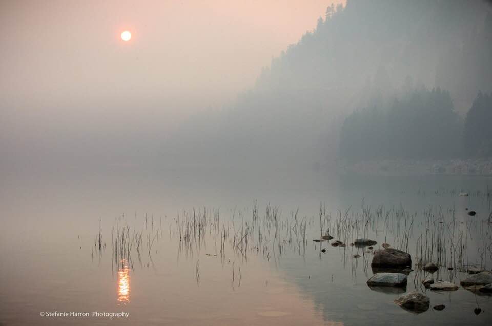 Sun Setting In Mist